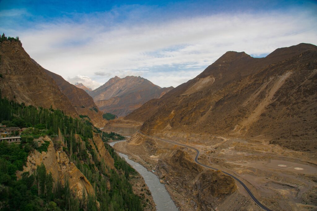 Scenic aerial view of Hunza Valley with river and mountains in Pakistan.